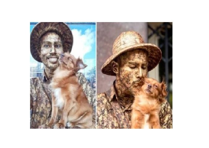 Cadelinha ajuda tutor trabalhando como estátua viva e encanta a todos