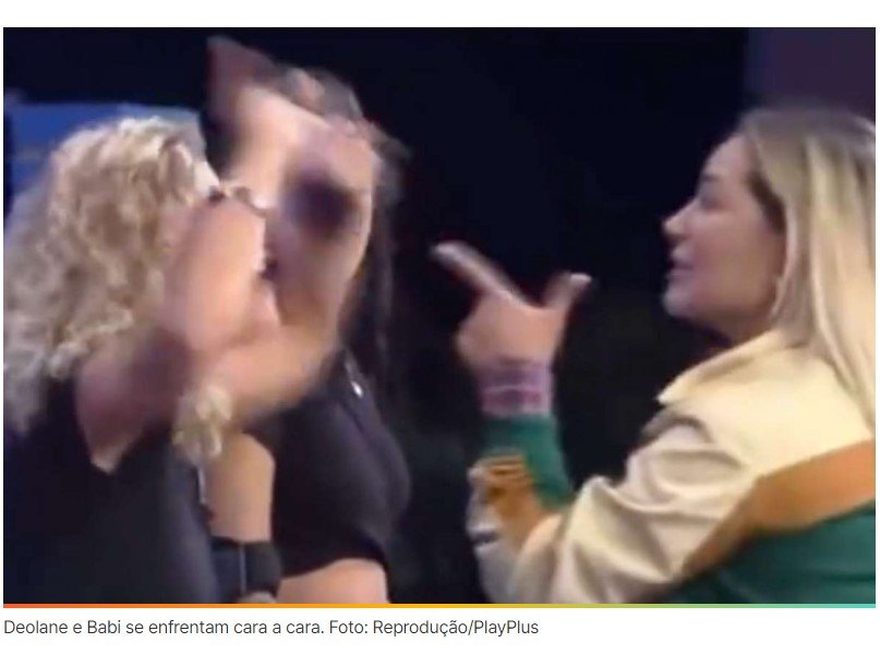 Peoas seguram Deolane para evitar agressão