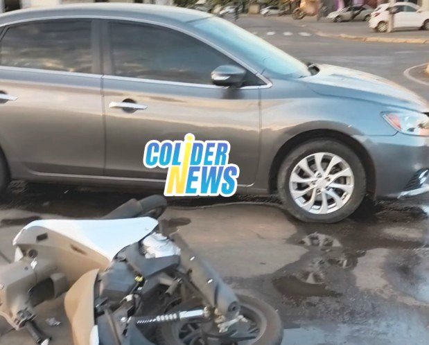 Em Colíder Mãe e filha em moto ficam feridas após atropelamento dentro de rotatória. (Vídeo)