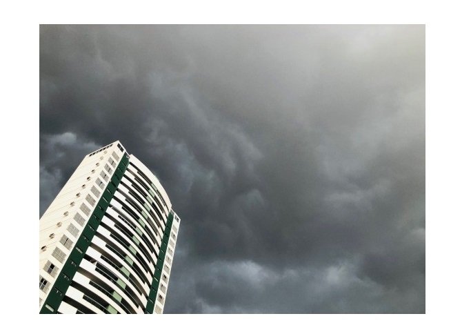 Chuva surpreende cuiabanos marcando chegada de frente fria a Mato Grosso